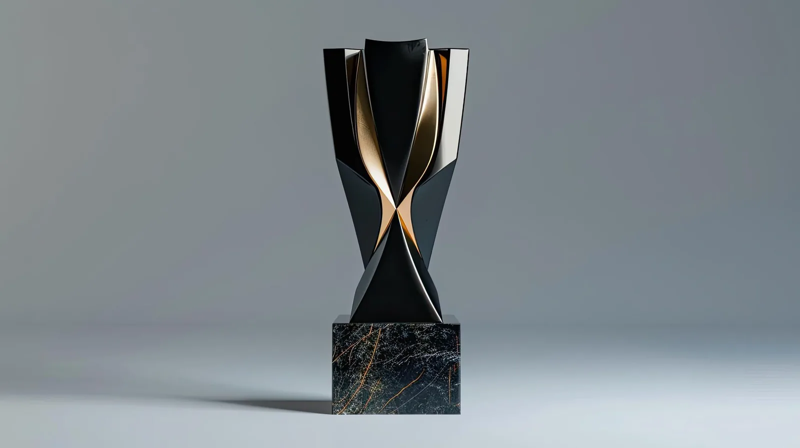 Crystal and gold trophy on marble base